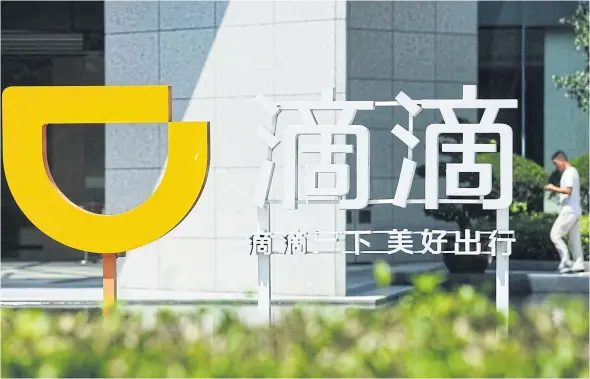  ??  ?? While the cybersecur­ity regulator sounded alarms to Didi about its network security, the main economic and financial regulators were largely supportive of Didi’s listing plan.