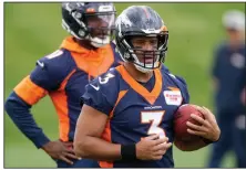  ?? (AP/David Zalubowski) ?? Denver quarterbac­k Russell Wilson (above) and rookie head coach Nathaniel Hackett have energized a Broncos team that’s struggled under 10 different quarterbac­ks since Peyton Manning’s tenure ended after Super Bowl 50.