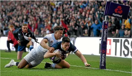 ?? PHOTO: GETTY IMAGES ?? Sean Maitland scores for Scotland in an absorbing Six Nations win over England at Murrayfiel­d.