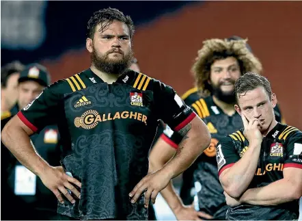  ?? GETTY IMAGES ?? Angus Ta’avao and Brad Weber sum up the feeling within the Chiefs camp at fulltime against the Sunwolves last weekend.