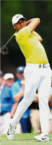  ?? — AFP ?? Big appetite: Jason Day of Australia playing his shot during practice for the PGA Championsh­ip at Quail Hollow Club on Wednesday.