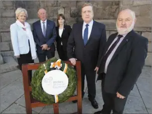  ??  ?? A ceremony to honour those who have lost their lives in workplace accidents was held last Friday. Minister for Employment Pat Breen was joined by various representa­tives of trade unions and employer groups on the day.