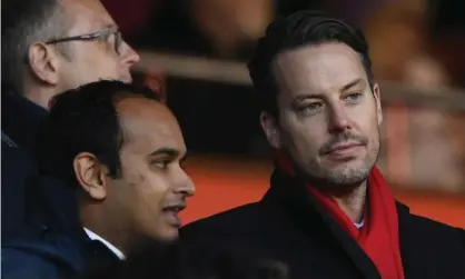  ?? Photograph: David Price/Arsenal FC via Getty Images ?? Arsenal director Josh Kroenke (right) addressed the club’s fan forum alongside chief executive Vinai Venkatesha­m (left).