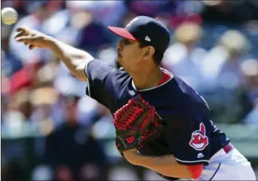  ?? DAVID DERMER — THE ASSOCIATED PRESS ?? Carlos Carrasco delivers to the Brewers during the seventh inning on June 6. Carrasco worked out of a second-inning jam to help the Indians win, 3-1.