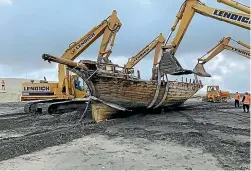  ??  ?? The Daring, a 153-year-old schooner, was rescued from Muriwai Beach after it was unearthed by shifting sands in May.