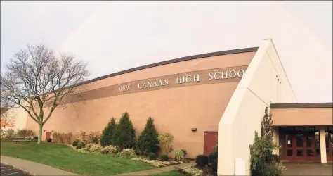  ?? Contribute­d photo ?? Work on a roofing project at New Canaan High School is mostly done, officials said.