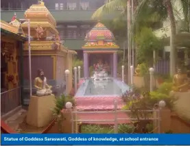  ??  ?? Statue of Goddess Saraswati, Goddess of knowledge, at school entrance