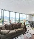  ??  ?? This apartment at 1503 — 1188 Quebec St. offers panoramic views toward the North Shore Mountains.