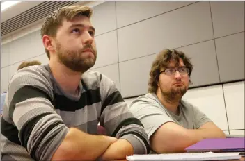  ?? Nikolas Samuels/The Signal (See additional photos at signalscv.com) ?? Spencer Benedetti, right, and his career counselor, Jonathan Flint listen to a presentati­on geared toward high-functionin­g autistic individual­s about becoming a computer numeric controlled machinist at Dr. Dianne G. Van Hook University Center at...