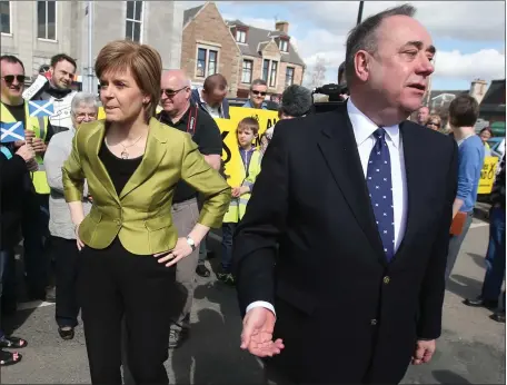  ??  ?? Nicola Sturgeon with Alex Salmond on the campaign trail in 2015. The once-close allies are now embroiled in a row that has shaken the SNP