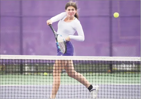  ?? Tyler Sizemore / Hearst Connecticu­t Media ?? Westhill’s Niki Economidis returns a shot during a match against Ridgefield in Stamford on Monday.