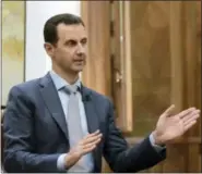  ?? SANA — FILE PHOTO VIA THE ASSOCIATED PRESS ?? On Feb. 10, Syrian President Bashar Assad speaks during an interview with Yahoo News in Damascus. Syria decried a U.S. missile strike early Friday on a government-controlled air base where U.S. officials say the Syrian military launched a deadly...