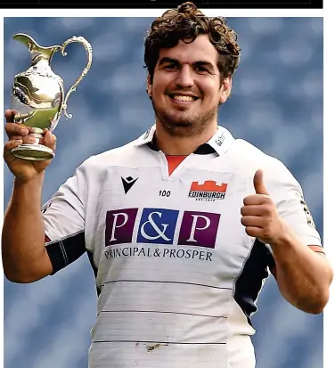  ??  ?? Capital kings: Edinburgh skipper Stuart McInally lifts the 1872 Cup after beating the Warriors on Saturday