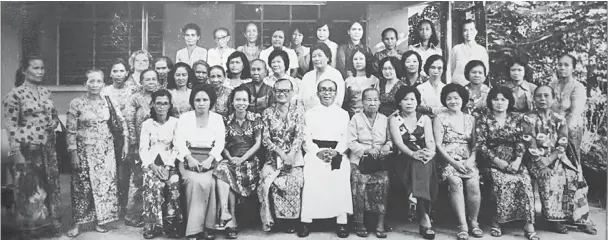  ??  ?? Lim with St Faith’s Church Women’s Fellowship members outside the vicarage on July 4, 1972.