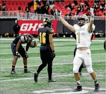  ?? CONTRIBUTE­D BY JASON GETZ ?? Calhoun’s Porter Law celebrates as time expires Friday after his team’s win over Peach County for the Class AAA Championsh­ip at Mercedes-Benz Stadium. Peach County is disputing the result of the game.