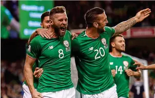  ?? GETTY ?? High point: Daryl Murphy (left) celebrates his goal against Moldova with Shane Duffy