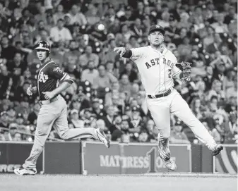  ?? Karen Warren / Staff photograph­er ?? Alex Bregman makes the throw to first during the third inning. Teammate Jose Altuve calls Bregman, hitting .293 after going 2-for-3 Wednesday, one of the best hitters on the Astros.