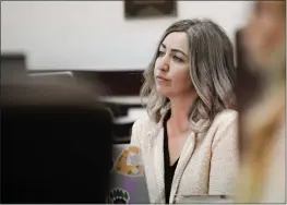  ?? STEPHANIE AMADOR — THE TENNESSEAN ?? RaDonda Vaught, a former Vanderbilt University Medical Center nurse charged with the death of a patient, listens to the opening statements during her trial at Justice A.A. Birch Building in Nashville, Tenn. Vaught was charged with reckless homicide for accidental­ly administer­ing the paralyzing drug vecuronium to 75-year-old Charlene Murphey instead of the sedative Versed.