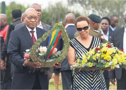  ?? Picture: Neil McCartney ?? REMEMBERED. President Jacob Zuma and Chris Hani’s widow, Limpho, lay wreaths during a service on the 24th anniversar­y of Hani’s murder at the Thomas Nkobi cemetery in Boksburg yesterday.