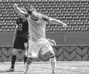  ?? CANADIAN PREMIER LEAGDUE ?? Alessandro Riggi celebrates a goal by HFX Wanderers teammate Pierre Lamothe during a CPL win over Valour FC in Winnipeg on Saturday.