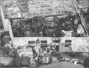  ?? Los Angeles Times/tns ?? An aerial view of the burned “Ghost Ship” warehouse on in December 2016.