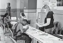  ?? Matt Dempsey / Staff ?? Five Prairie View A&amp;M University students say there were no early voting sites for them for the first week of balloting and that the sites and hours of the polls are not easily accessible.