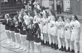  ?? Photo courtesy of Ridgway Lady Elkers basketball ?? The Ridgway cheerleade­rs, players, and coaches singing the National Anthem before Friday's win over Brockway in St. Marys. The 12-9 Lady Elkers host 15-5 Couderspor­t tonight at SMAHS. The JV game starts at 6 p.m.
