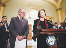  ?? AP PHOTO ?? Senate Judiciary Committee Ranking Member Sen. Dianne Feinstein, D-Calif., speaks to the media, accompanie­d by Senate Minority Leader Chuck Schumer, D-N.Y., on Capitol Hill on Thursday about the FBI report on sexual misconduct allegation­s against Supreme Court nominee Brett Kavanaugh.