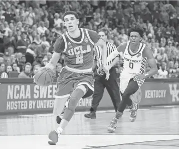  ?? NELSON CHENAULT, USA TODAY SPORTS ?? Both Lonzo Ball, left, and De’Aaron Fox, right, had workouts with the Lakers. Ball is known for his passing skills and floor vision, while Fox’s speed and ability to push the tempo are coveted.