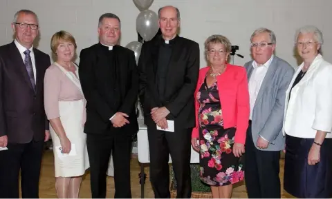  ??  ?? Fr John Carroll with the Bishop, staff and officials at the Bishop’s House where his is the Diocesan Secretary and Diocesan Communicat­ions Officer. From left: Eugene Doyle, Marian Stack, Fr John Carroll, Bishop Denis Brennan, Edith Redmond, Liam Gaynor...