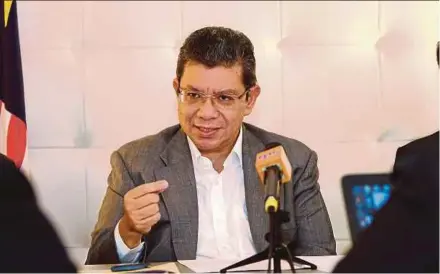  ?? BERNAMA PIC ?? Foreign Minister Datuk Saifuddin Abdullah speaking at a press conference, ahead of the Asia-Europe Meeting Summit, in Brussels yesterday.