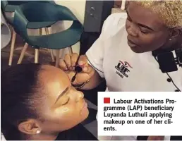  ?? ?? Labour Activation­s Programme (LAP) beneficiar­y Luyanda Luthuli applying makeup on one of her clients.