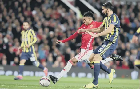  ??  ?? Jesse Lingard hits home Manchester United’s fourth goal in last night’s Europa League win over Fenerbahce