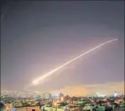  ?? AP PHOTO ?? The Damascus sky lights up with missile fire as the US, the UK and France launch an attack on Syrian targets.