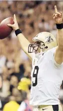  ??  ?? DREW BREES, de los Saints, celebra luego de anotar.