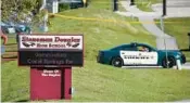  ?? WILFREDO LEE/AP ?? The shooting at Marjory Stoneman Douglas High was the subject of numerous lawsuits against the Broward School District. The School Board found an unusual path to settle the case, agreeing to let it be settled as a civil-rights matter.