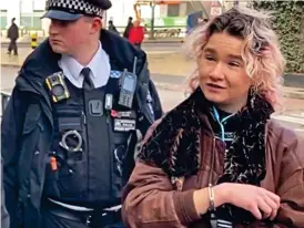  ?? ?? Under arrest: Phoebe Plummer, 22, in handcuffs on Wednesday