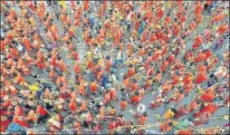  ?? PTI ?? Devotees of Shiva carry kanwar on their shoulders as they march during their annual pilgrimage in the holy month of Sawan, in Jabalpur, Madhya Pradesh, on Monday.