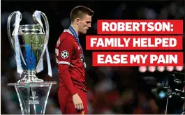  ??  ?? SO CLOSE : Andrew Robertson reflects on the final defeat by Real Madrid