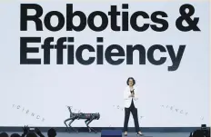  ?? (Albert Gea/Reuters) ?? RIMA QURESHI, EVP chief strategy officer of Verizon, presents a robot during the Mobile World Congress in Barcelona yesterday.