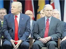  ?? EVAN VUCCI/AP ?? President Donald Trump, left, appears with Attorney General Jeff Sessions during the FBI National Academy graduation ceremony in Quantico, Va., last year.