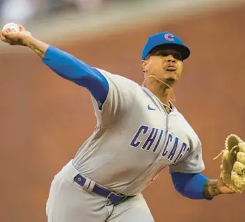  ?? GODOFREDO A. VÁSQUEZ/AP ?? Cubs starter Marcus Stroman pitches against the San Francisco Giants during the first inning in San Francisco on Friday.