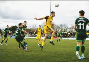  ?? PICTURES: PA Images ?? HEAD FIRST: Sutton United striker Omar Bugiel nods the ball on