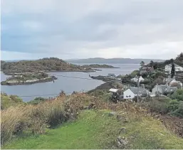  ??  ?? Holiday time should be used wisely to drink in views such as this panorama out to Loch Fyne from Tarbert, Argyll.