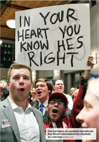  ?? PHOTO AFP ?? Des partisans du candidat républicai­n Roy Moore attendaien­t les résultats du vote hier.