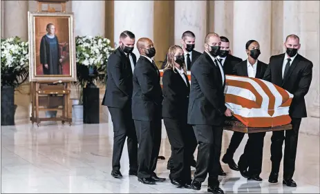 ?? ANDREW HARNIK/THE NEW YORK TIMES ?? The flag-draped casket of Ruth Bader Ginsburg is carried Wednesday into the Supreme Court. Ginsburg died Friday at 87.