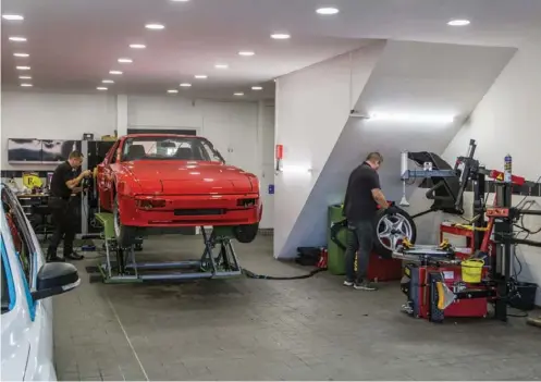  ??  ?? Right: The detailing bay is well lit and spacious ensuring cars such as this 944 can be accessed from all angles. This car was being prepared for the showroom and looked fantastic