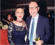  ??  ?? US Chargé D’affaires Eric Khant and his lovely wife Halima enjoy the night out to show support to the South African High Commission.