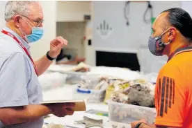  ?? ?? Palaeobiol­ogist Dr Richard Holdaway discusses the moa bone sampling process with Te Ahu a Turanga kaitiaki Terry Hapi at Te Manawa in Palmerston North.