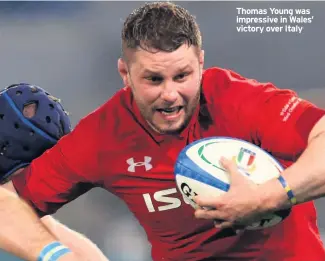  ??  ?? Thomas Young was impressive in Wales’ victory over Italy